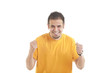 © IndiaPix - Portrait of happy Indian young man cheering with clenched fists isolated over white background
