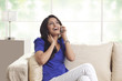 © IndiaPix - Woman talking on a mobile phone