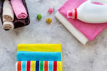 Clean towel on grey stone background top view copyspace