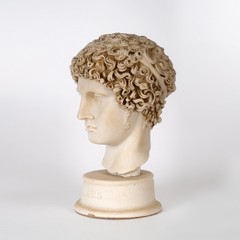 Souvenir picture of the head of the ancient Greek god of commerce and Tricks