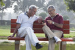 © IndiaPix - Old men reading an sms
