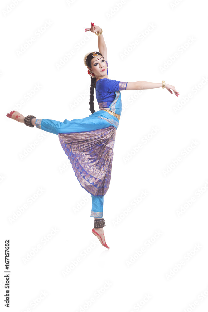 Full Length Of Dancer In Traditional Wear Performing Bharatanatyam