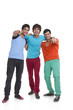 © IndiaPix - Full length of young male friends pointing at you over white background