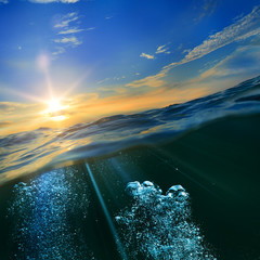 Wall Mural - sky and sea water divided by waterline. ocean aquatic nature design. tropical shining waters