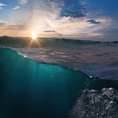 Wall Mural - ocean view design template with underwater part and sunset skylight