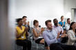 © ReeldealHD images - Audience at a conference applauding speaker