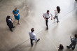 © ReeldealHD images - Overhead shot of busy office lobby, atrium, reception