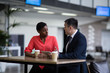 © ReeldealHD images - Business colleague talking with each other in office cafeteria