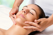© karelnoppe - Beauty facial massage on female chin.