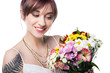 © LIGHTFIELD STUDIOS - smiling young woman holding beautiful bouquet of flowers isolated on white