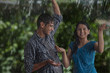 © IndiaPix - Couple enjoying in the rain