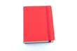 Red leather notebook isolated on white background.