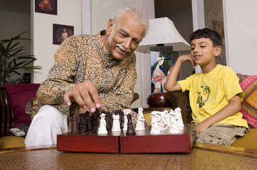 Grandfather playing with grandson 