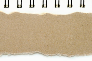 brown ripped paper on book white paper color background, have copy space for put text