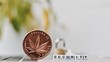 © adriantoday - Marijuana security brass coin