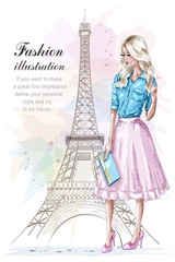 Sticker - Beautiful blonde hair girl with hand bag. Fashion woman with eiffel tower on background. Hand drawn young woman in fashion clothes. Sketch. Vector illustration.