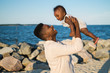 © Leslie Kershaw - mom and son smile lovingly at beach