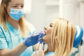 Wall Mural - Woman in Dentist Office