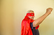 © Vivida Photo PC - old super hero raising fist