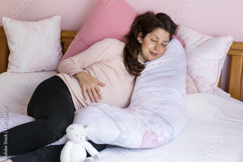 Beautiful Pregnant Woman Sleeping Comfortable With Tummy