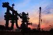 In the evening of oilfield pipeline silhouette