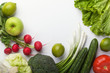 Various fresh raw vegetables and fruits on light background, top view