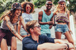 © Jacob Lund/Stocksy - Group of teenage friends having fun on the city street