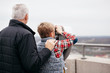 © Kelly Knox/Stocksy - grandchild sightseeing with his grandparent