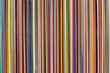 Vertical stripes of various colors thin width with texture.
