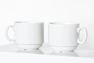 Two white coffee cups mock up