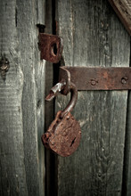 Old Rusty Opened Lock Without Key. Vintage Wooden Door, Close Up Concept Photo