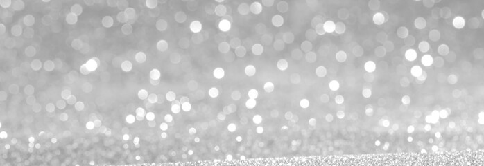 Wall Mural - silver and white bokeh lights defocused. abstract background