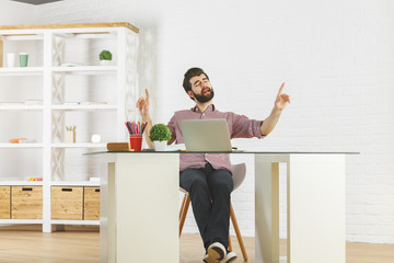 Canvas Print - Crazy businessman singing at workplace