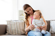 © Syda Productions - happy young mother with little baby at home