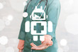 © wladimir1804 - Medical Robotics Information Innovative Technology Integration concept. Doctor offers robot icon on a virtual graphical user interface.