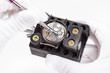 © vvoe - repairing of wristwatch with screwdriver close up