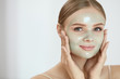 Peeling Beauty Mask. Female Applying Peel Off Mask On Face