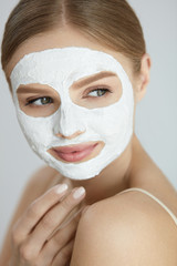 Wall Mural - Skin Care Mask. Close Up Of Woman With White Face Mask