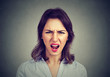 © pathdoc - Annoyed angry woman screaming. Negative human emotions