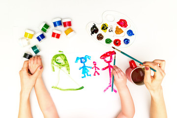 Wall Mural - Child's hands painting a family