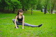 © zorgens - Girl in the park warming up sport