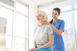 © Africa Studio - Physiotherapist working with elderly patient in clinic