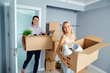 © Studio Romantic - Happy couple in a new apartment for a housewarming.