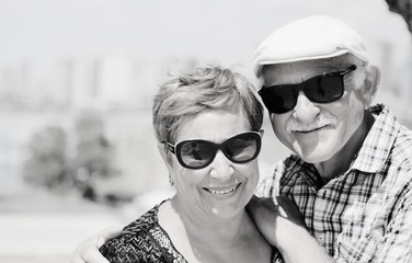 Wall Mural - Portrait of senior couple walking outdoors