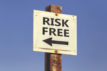 Risk free word and arrow signpost 2