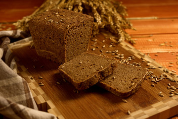 Wall Mural - Still life with rye bread, ears of corn