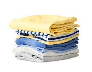 Wall Mural - Folded stack clothes isolated on white.