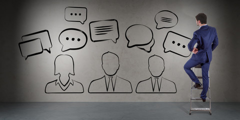 Wall Mural - businessman watching discussion icons sketch on a wall 3d rendering