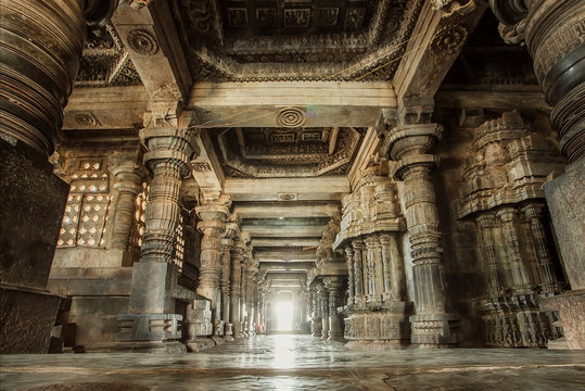 columns and empty corridor inside the 12th century stone temple hoysaleswara, now karnataka state of