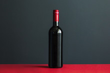 Bottle Of Wine On Red Table